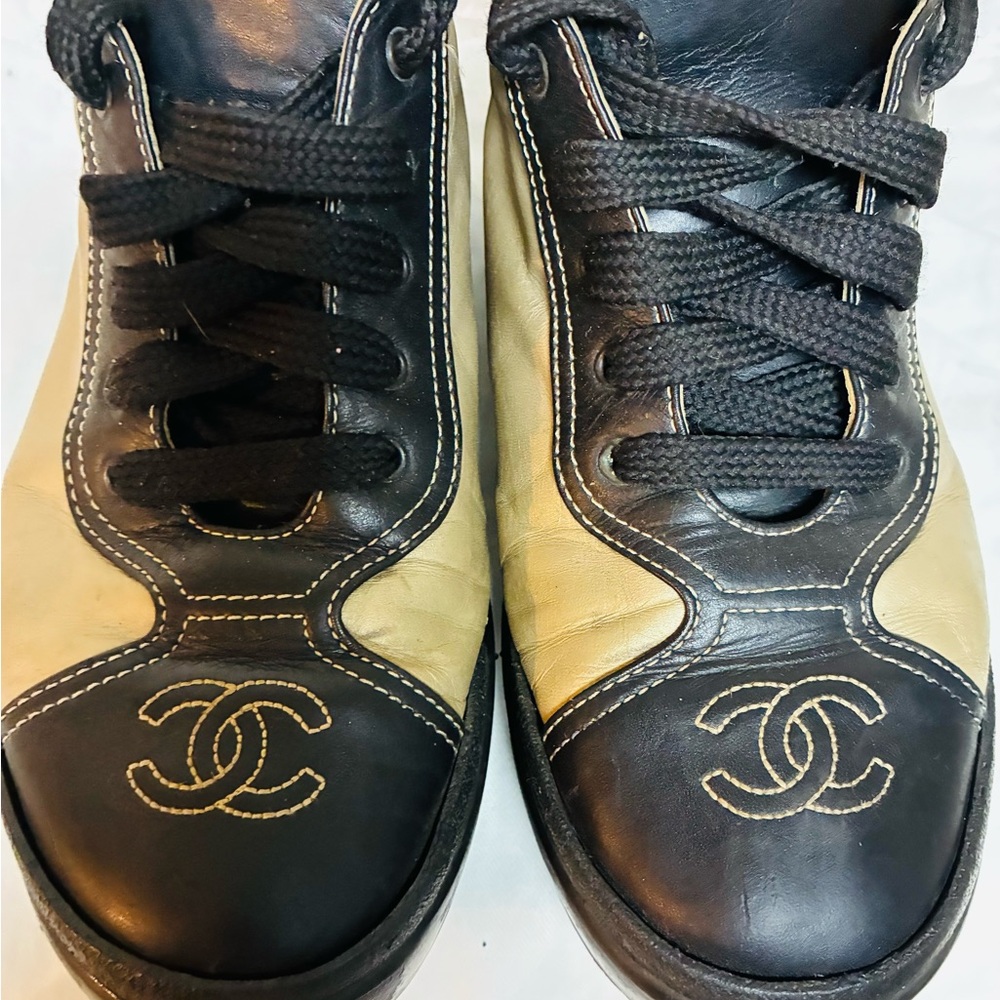 Authentic Chanel
Vintage Interlocking CC Logo Sneakers.